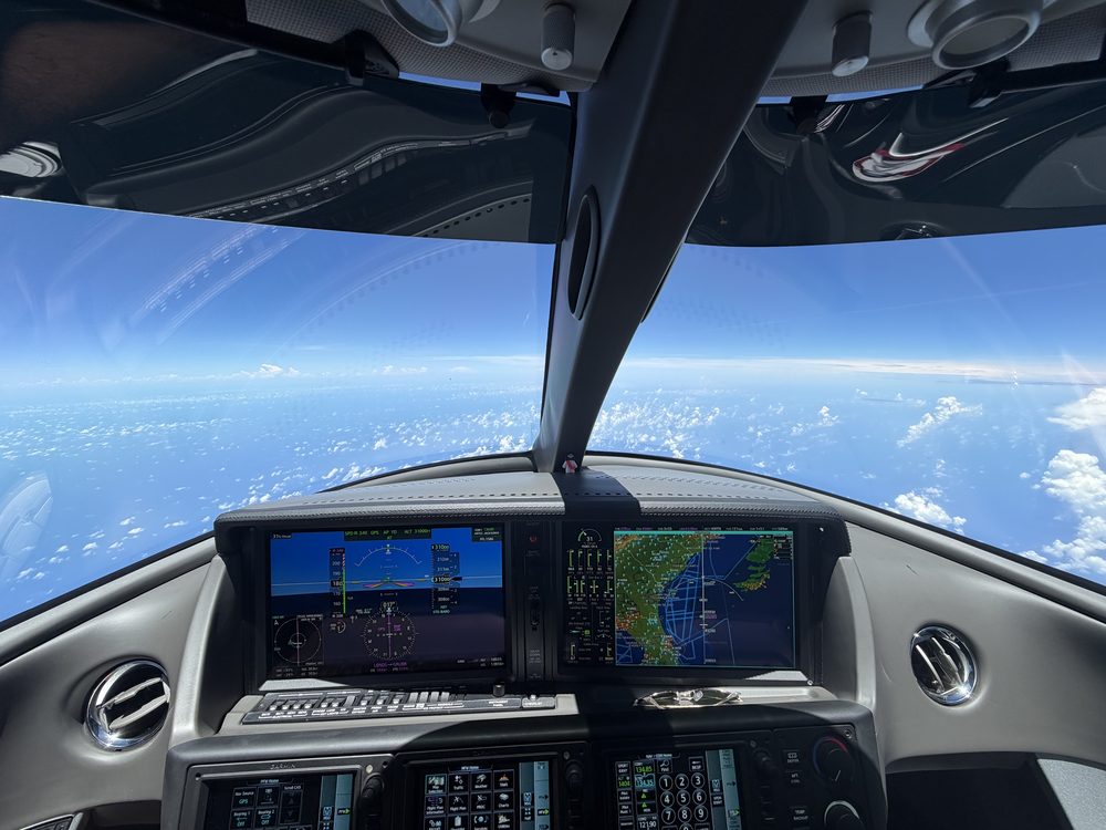 SF50 Vision Jet cockpit in clear skies on a repositioning flight