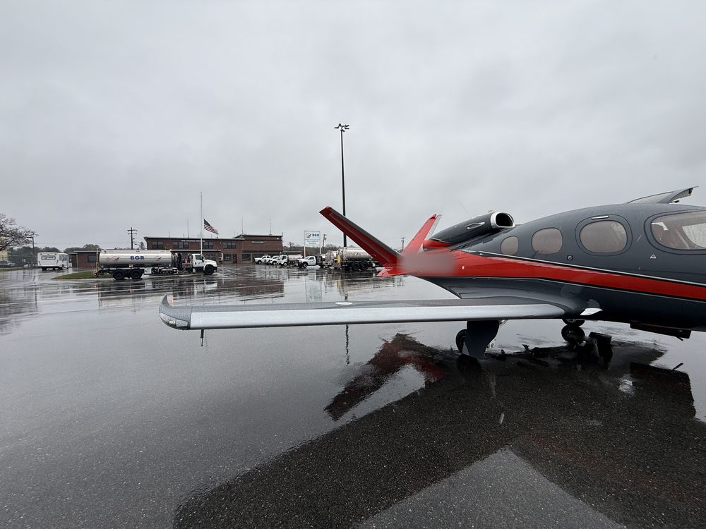 Vision Jet on a rainy ramp