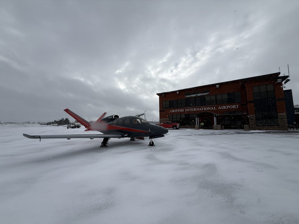 Cirrus SF50 Vision Jet on a snowy ramp at Griffiss International Airport